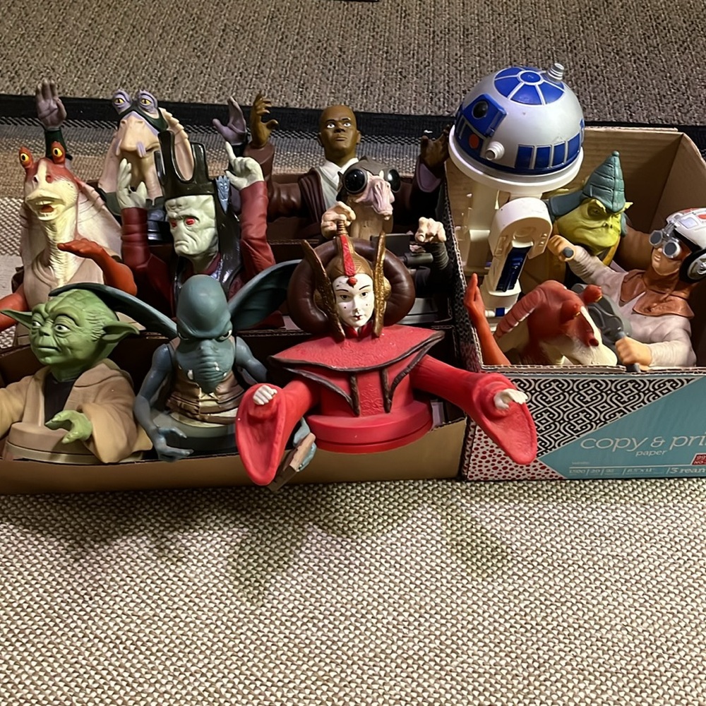 Collection of Star Wars cup toppers cups not included.plastic